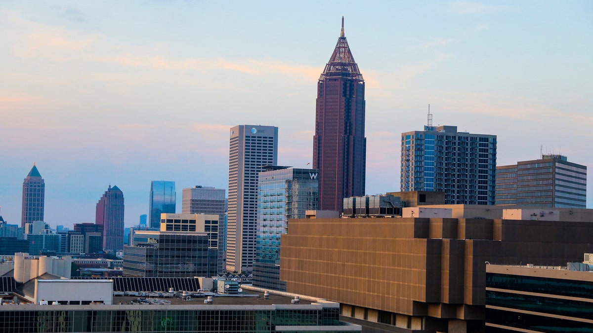 Downtown Atlanta is seen from the SkyView Atlanta, a 200-foot (61-meter) tall Ferris wheel with 42 gondolas, in downtown Atlanta, Georgia, July 18, 2013. The Ferris wheel, which was previously located in Paris, Switzerland, and Pensacola, Florida, opened to the public in Atlanta on July 16. Picture taken on July 18, 2013. REUTERS/Chris Aluka Berry (UNITED STATES - Tags: ENTERTAINMENT CITYSPACE SOCIETY) - TM4E97L10UG01