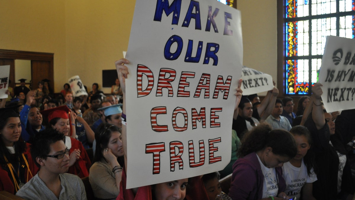File: Over 250 so-called DREAMers, or undocumented youth who have been brought into the United States illegally by their parents, hold their annual DREAM Act Graduation, then march and protest outside of the Supreme Court of the United States.