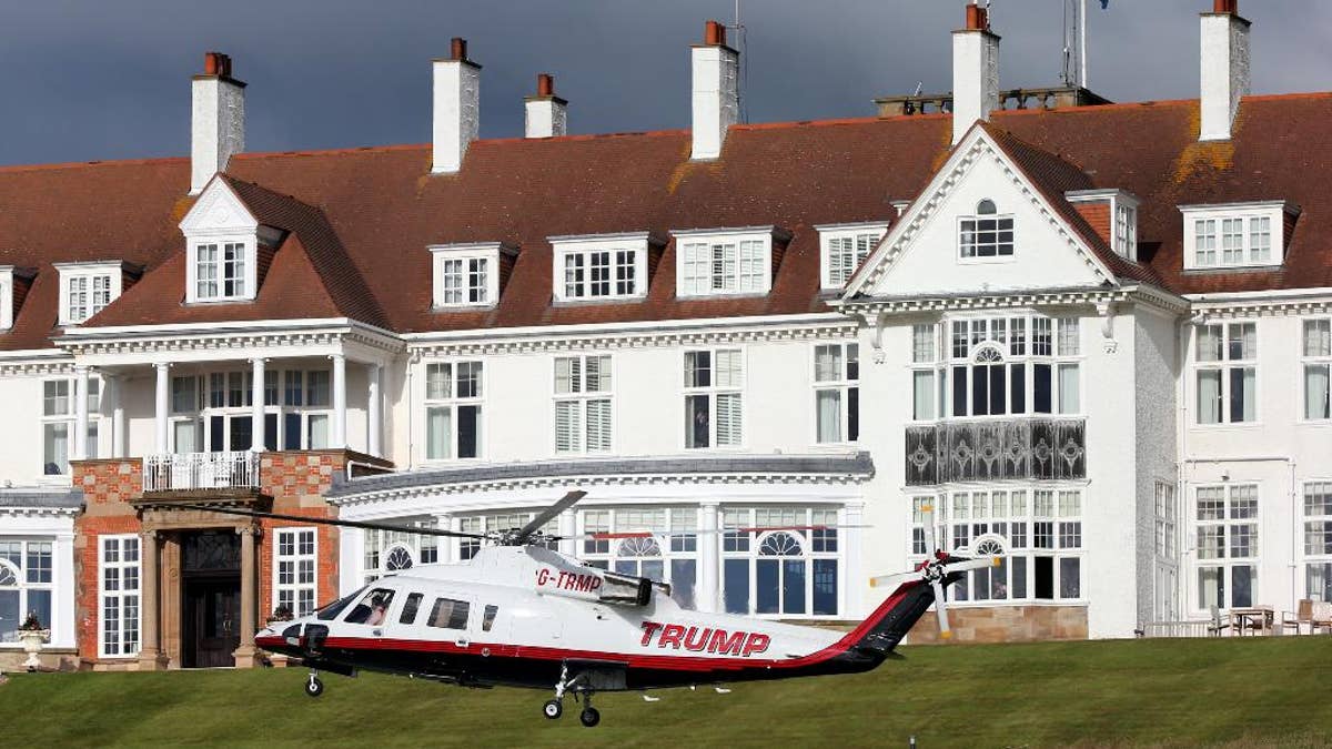 A helicopter owned by Donald Trump departs from the Turnberry golf course in Turnberry, Scotland, Wednesday, July 29, 2015. The Women's British Open golf championship is being held at Turnberry golf course from July 30 until Aug. 2. (AP Photo/Scott Heppell)