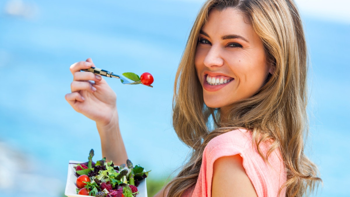 woman eating healthy istock