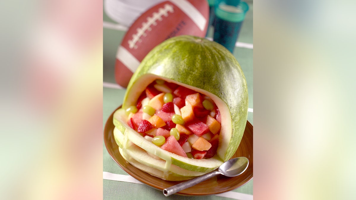 Though it's hard to imagine munching on anything other than salty snacks or sweet treats during the game, there's virtue in offering at least one healthy treat.