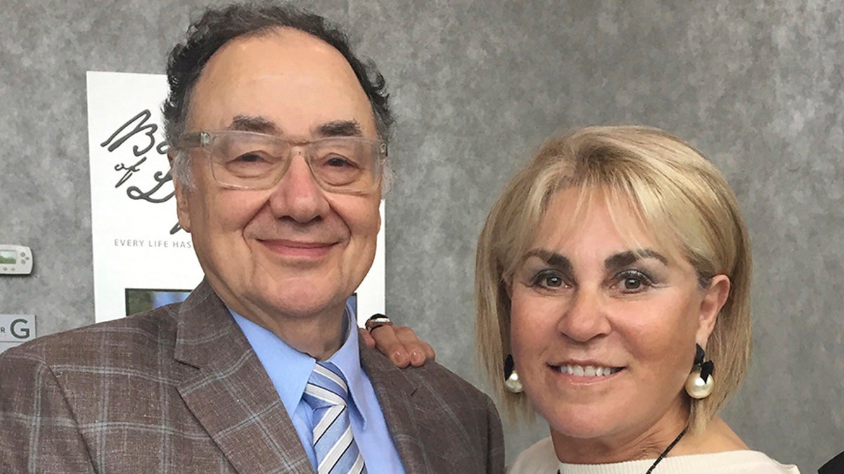 In this Oct. 15, 2017 photo provided by the United Jewish Appeal via Canadian Press, Barry and Honey Sherman pose for a photo in Toronto, Canada. At the conclusion of a six week investigation, police said Friday, Jan. 26, 2018, they believe the Canadian billionaire businessman and his wife were both murdered. (United Jewish Appeal Federation - Greater Toronto/Canadian Press via AP)