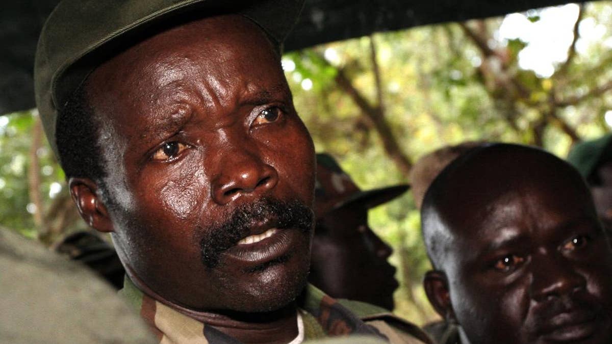 FILE - In this Nov. 12, 2006 file photo, the leader of the Lord's Resistance Army Joseph Kony answers journalists' questions following a meeting with UN humanitarian chief Jan Egeland at Ri-Kwangba in Southern Sudan. Kony has been Africa's most notorious warlord for three decades. Now that the United States and others are ending the international manhunt for him and his Lord's Resistance Army, it appears Kony may never be brought to justice. (AP Photo/Stuart Price, File)