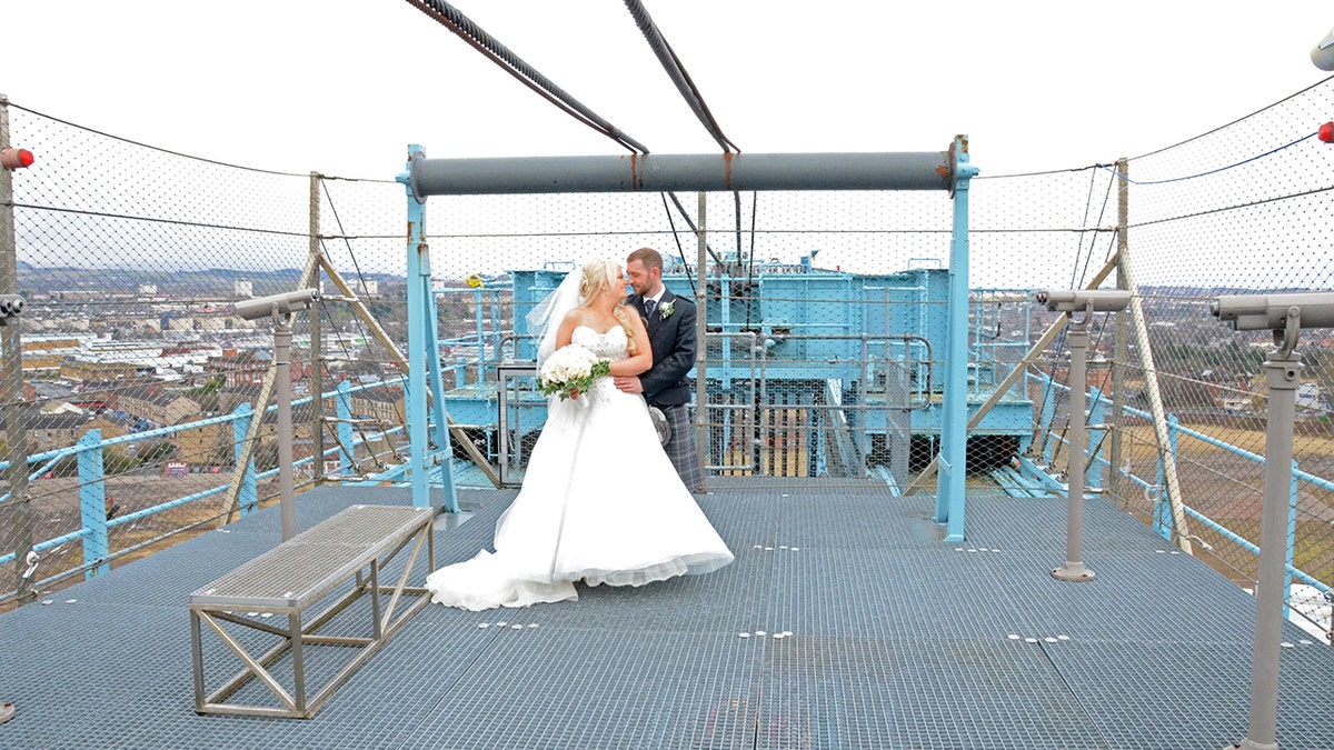 531e634b-crane wedding SWNS