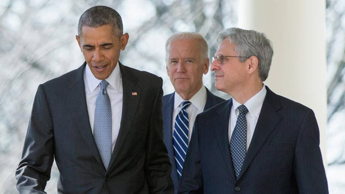 In this photo taken March 16, 2016, Federal appeals court judge Merrick Garland arrives with President Barack Obama and Vice President Joe Biden to be introduced as Obama’s nominee for the Supreme Court, during an announcement in the Rose Garden of the White House. Garland is now under consideration to be Biden's attorney general, causing worries by some on the left that it may be difficult to replace him with a GOP-controlled Senate. (AP Photo/Andrew Harnik, File)