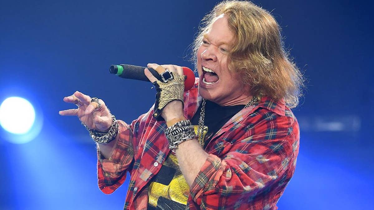 Axl Rose of the band AC/DC performs at the Olympic Stadium in London, Saturday, June 4, 2016. (Photo by Mark Allan/Invision/AP)-