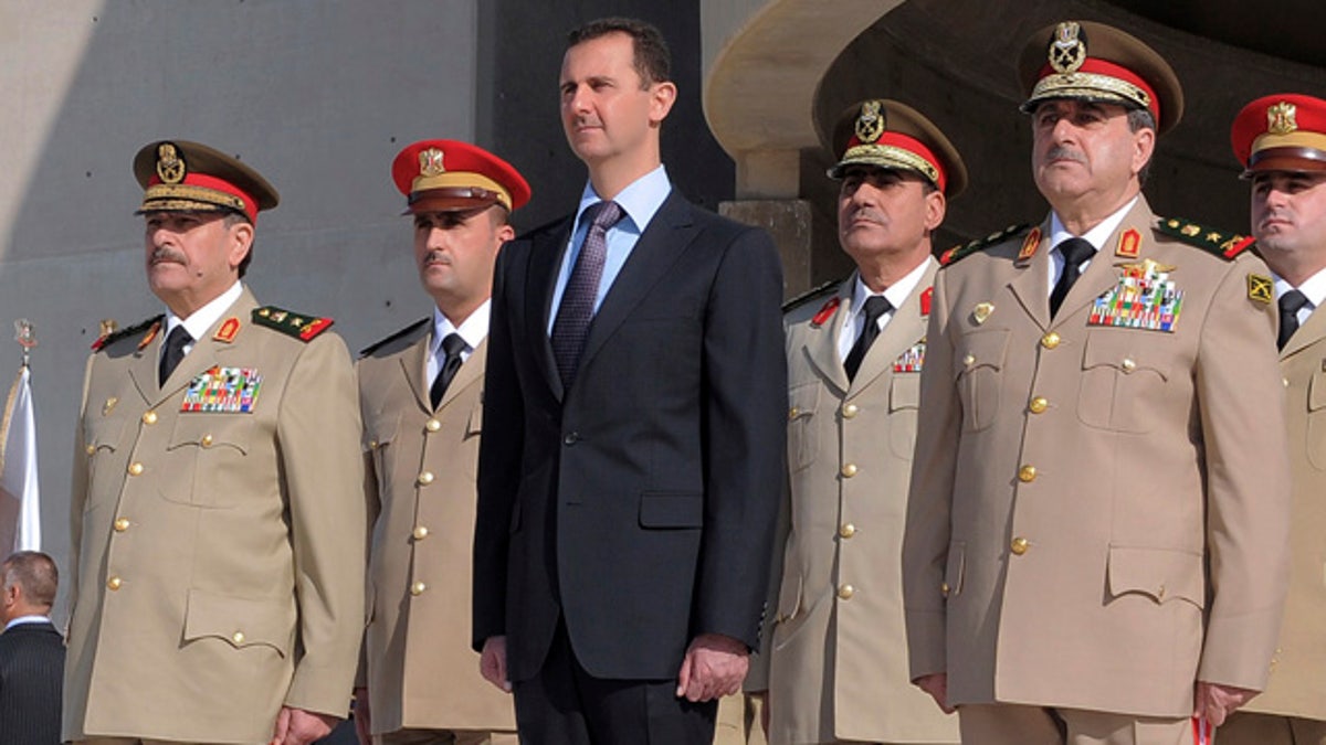 59a37564-APTOPIX Mideast Syria