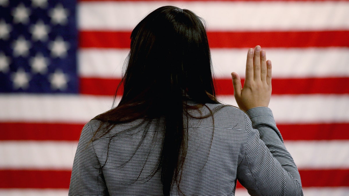 New citizen taking oath