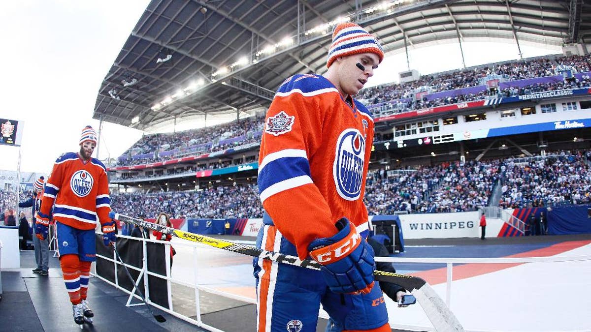 NHL ROUNDUP: Oilers shut out Jets in outdoor Heritage Classic – Macomb Daily