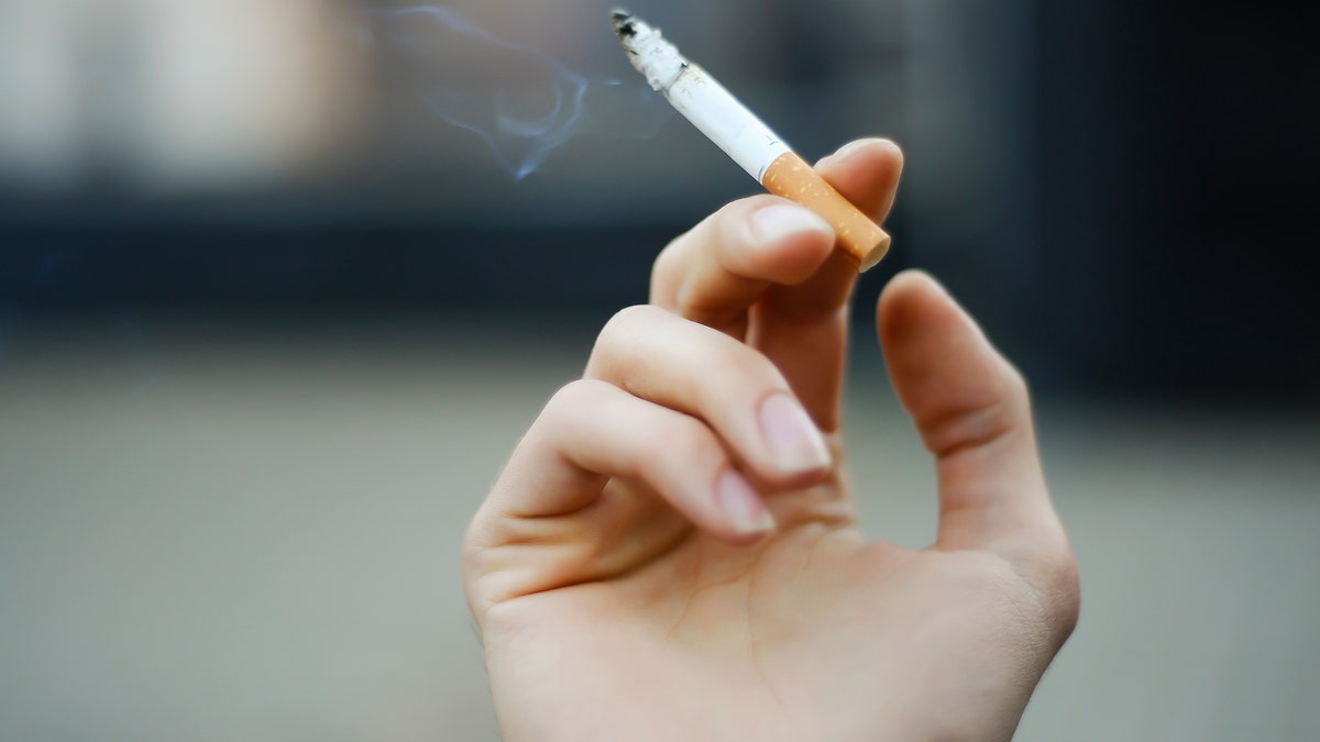 5cbb3b4a-smoking a cigarette smoking cigarettes lung cancer istock large