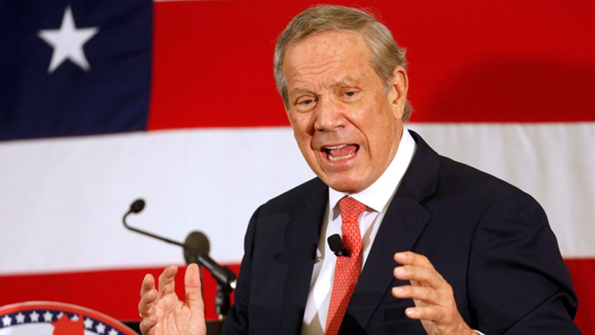 FILE - In this April 17, 2015 file photo, former Gov., N.Y., George Pataki speaks in Nashua, N.H. Pataki will announce May 28 in New Hampshire whether he intends to seek the Republican nomination for president, he said Thursday. (AP Photo/Jim Cole, File)