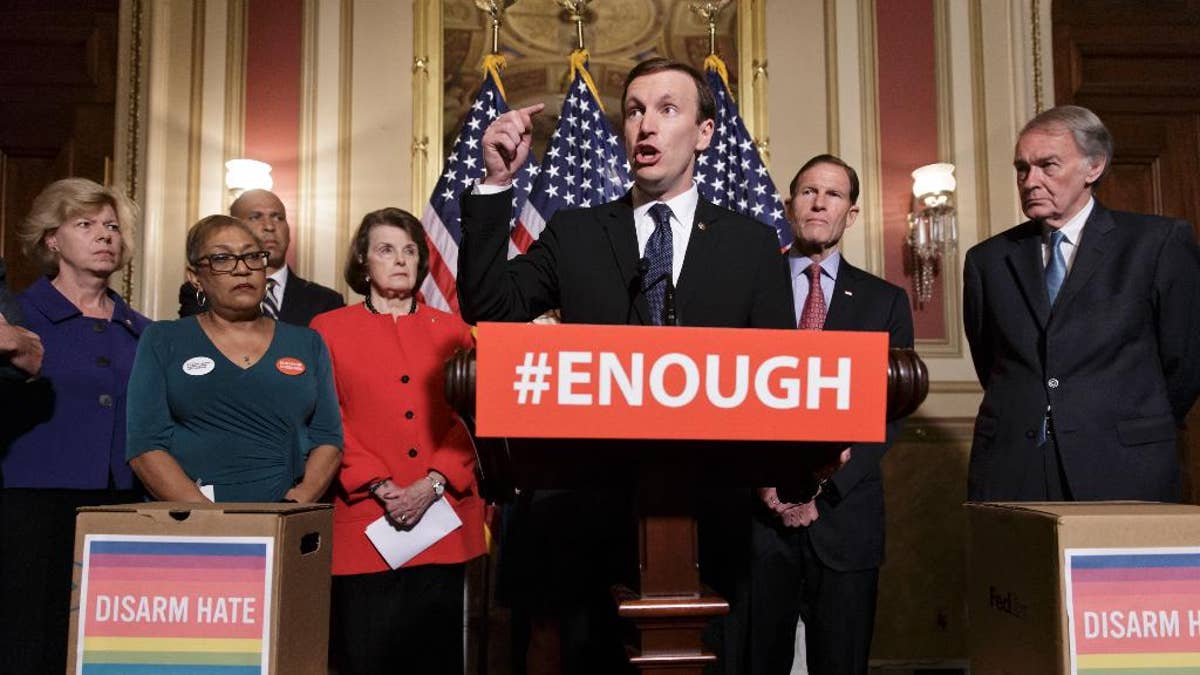 Sen. Chris Murphy, D-Conn., center, calls for gun control legislation in the wake of the mass shooting in an Orlando LGBT nightclub this week, Thursday, June 16, 2016, on Capitol Hill in Washington. From left are, Sen. Tammy Baldwin, D-Wis., Rev. Sharon Risher, Risher, a clinical trauma chaplain in Dallas, who lost her mother Ethel Lance and two cousins in the racially-motivated shooting at the historic Emanuel AME Church in Charleston, N.C. in 2015, Sen. Cory Booker, D-N.J., Sen. Dianne Feinstein, D-Calif., Murphy, Sen. Richard Blumenthal, D-Conn., and Sen. Ed Markey, D-Mass. (AP Photo/J. Scott Applewhite)