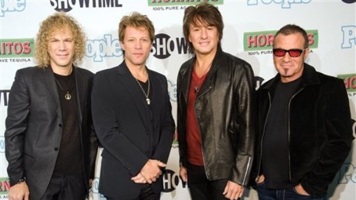 Bon Jovi band members David Bryan, Jon Bon Jovi, Richie Sambora and Tico Torres attend the premiere of Showtime's "Bon Jovi: When We Were Beautiful" documentary in New York, Wednesday, October 21, 2009. (AP Photo/Charles Sykes)
