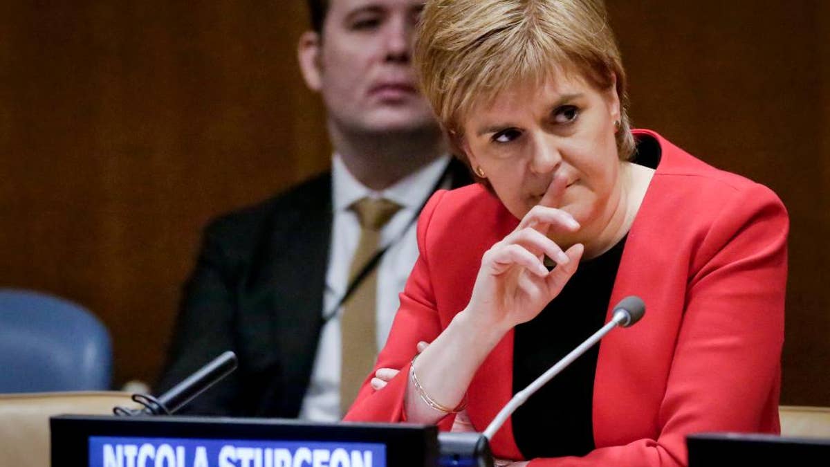 Nicola Sturgeon listening intently