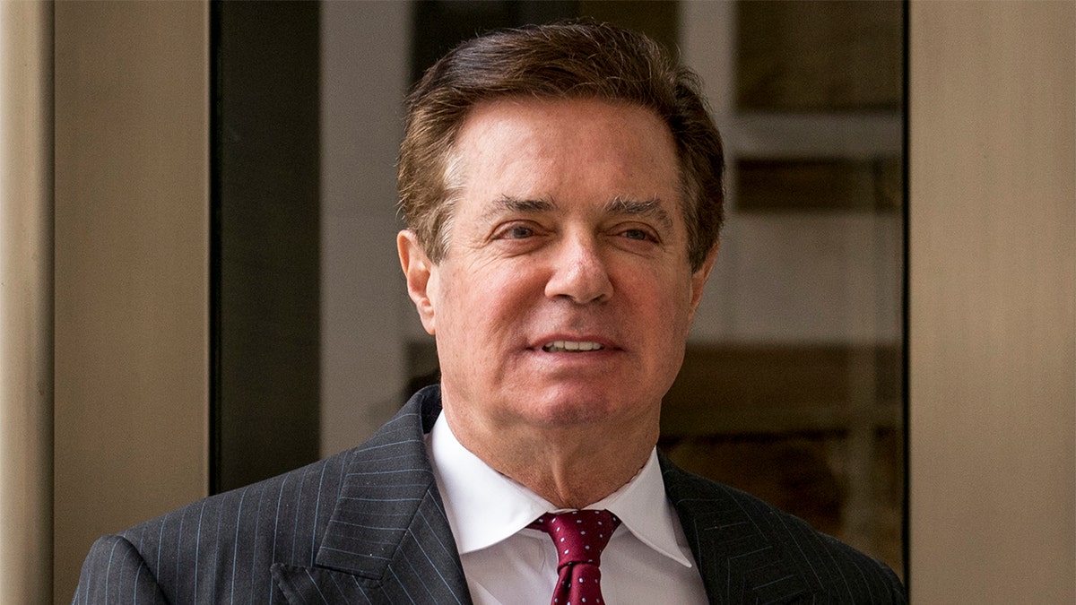 FILE - In this April 4, 2018, file photo, Paul Manafort, President Donald Trump's former campaign chairman, leaves the federal courthouse in Washington. Manafort is appealing a judgeâs decision to jail him while he awaits trial on several felony charges. Attorneys for Paul Manafort filed a notice of appeal Monday saying they want a federal appeals court to review the order by U.S. District Judge Amy Berman Jackson. They also are appealing Jacksonâs order dismissing a civil suit Manafort brought challenging special counsel Robert Muellerâs authority to prosecute him. (AP Photo/Andrew Harnik, File)