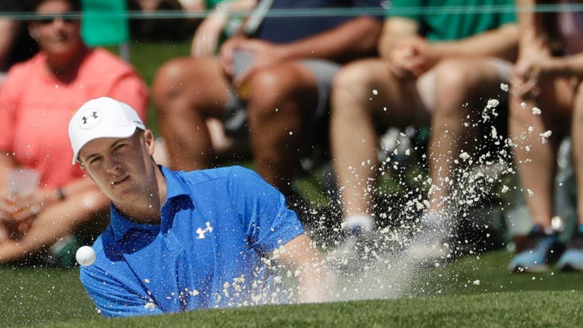 Jordan Spieth hits from a bunker on the second hole during the final round of the Masters golf tournament Sunday, April 9, 2017, in Augusta, Ga. (AP Photo/Matt Slocum)