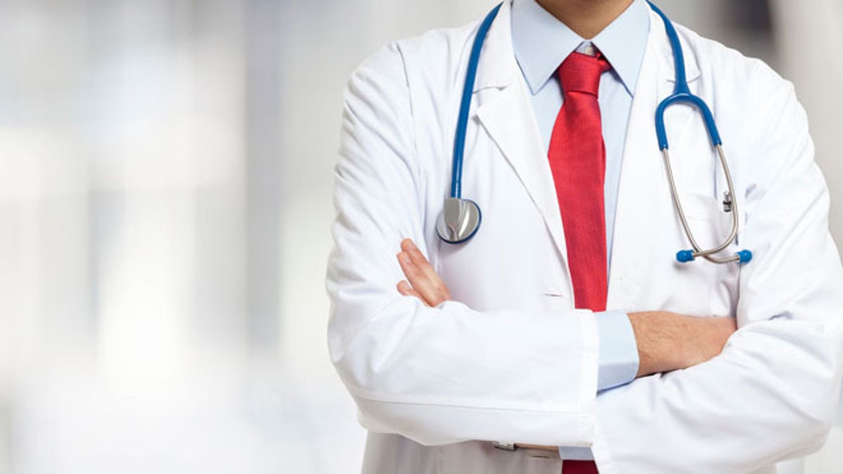 Doctor in front of a bright background