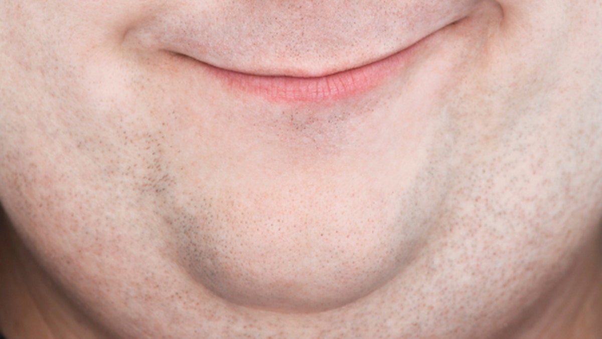 Extreme Closeup Portrait Of Overweight Man's Face