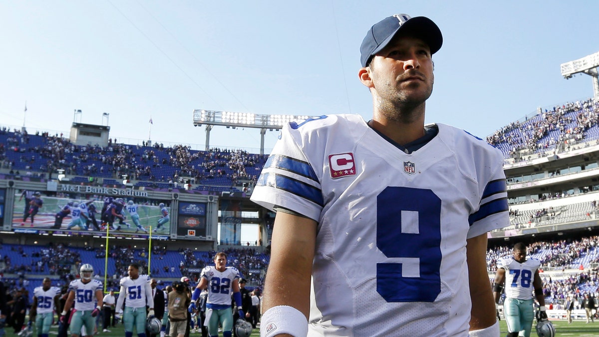 Dallas Cowboys quarterback Tony Romo walks off the field after an NFL football game against the Baltimore Ravens in Baltimore, Sunday, Oct. 14, 2012. Baltimore won 31-29. (AP Photo/Patrick Semansky)