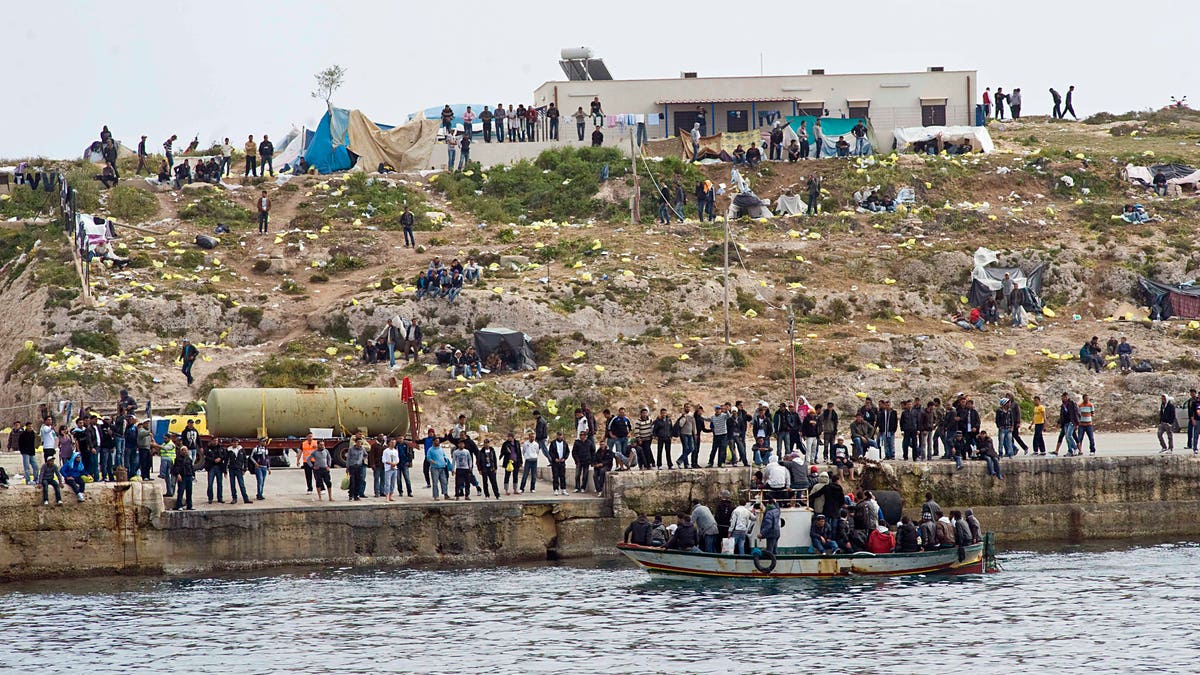 6bc5d20f-Italy Migrants