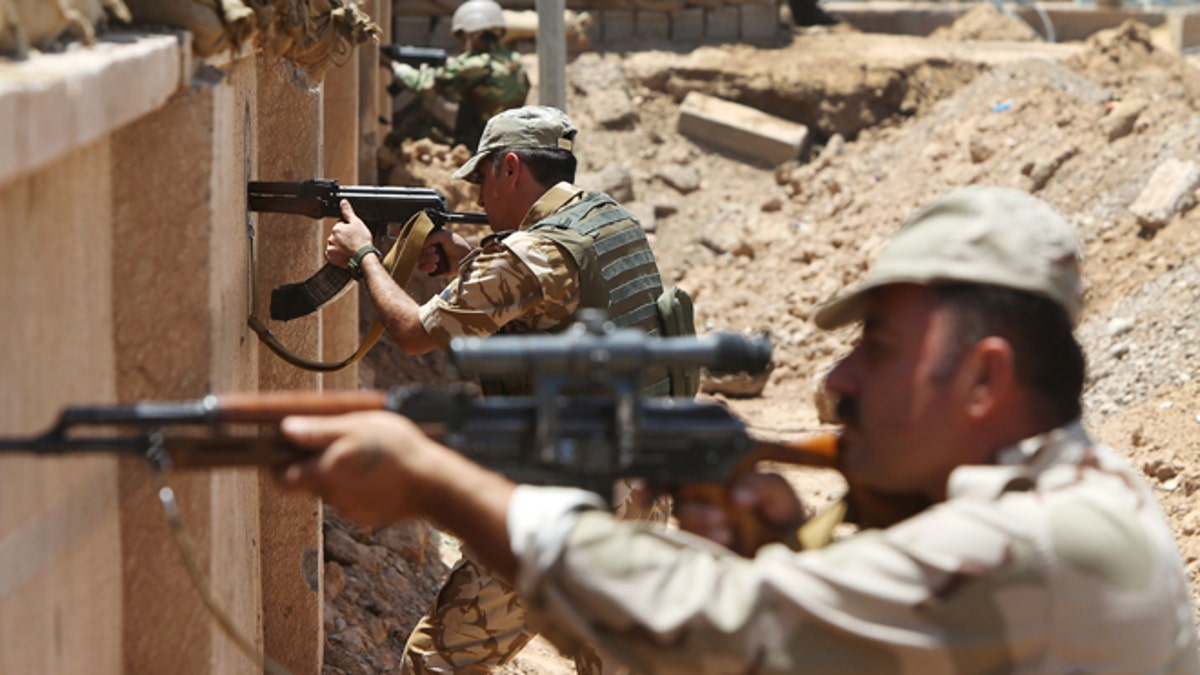 6e42b6a8-Mideast Iraq