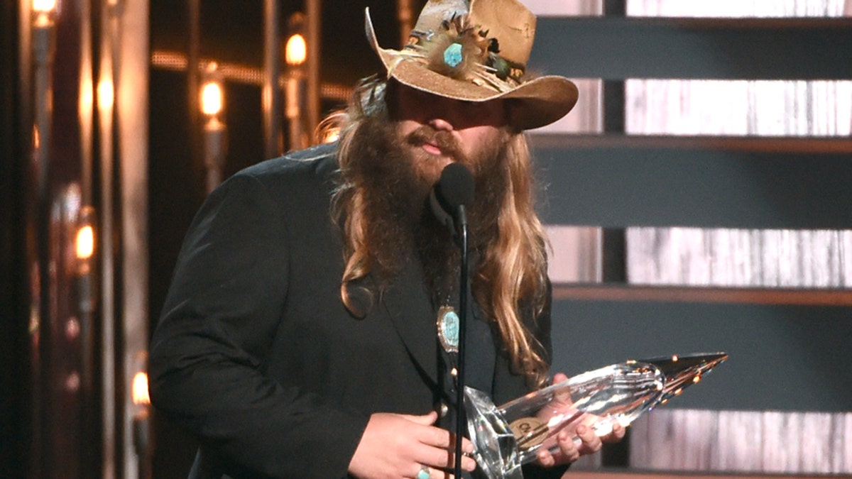 Chris Stapleton accepts the award for new artist of the year at the 49th annual CMA Awards at the Bridgestone Arena on Wednesday, Nov. 4, 2015, in Nashville, Tenn.