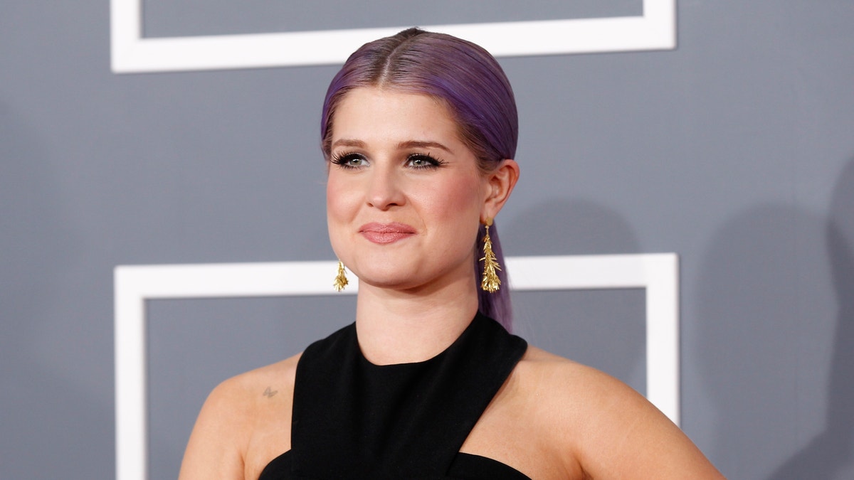 Television personality Kelly Osbourne arrives at the 55th annual Grammy Awards in Los Angeles, California February 10, 2013. 