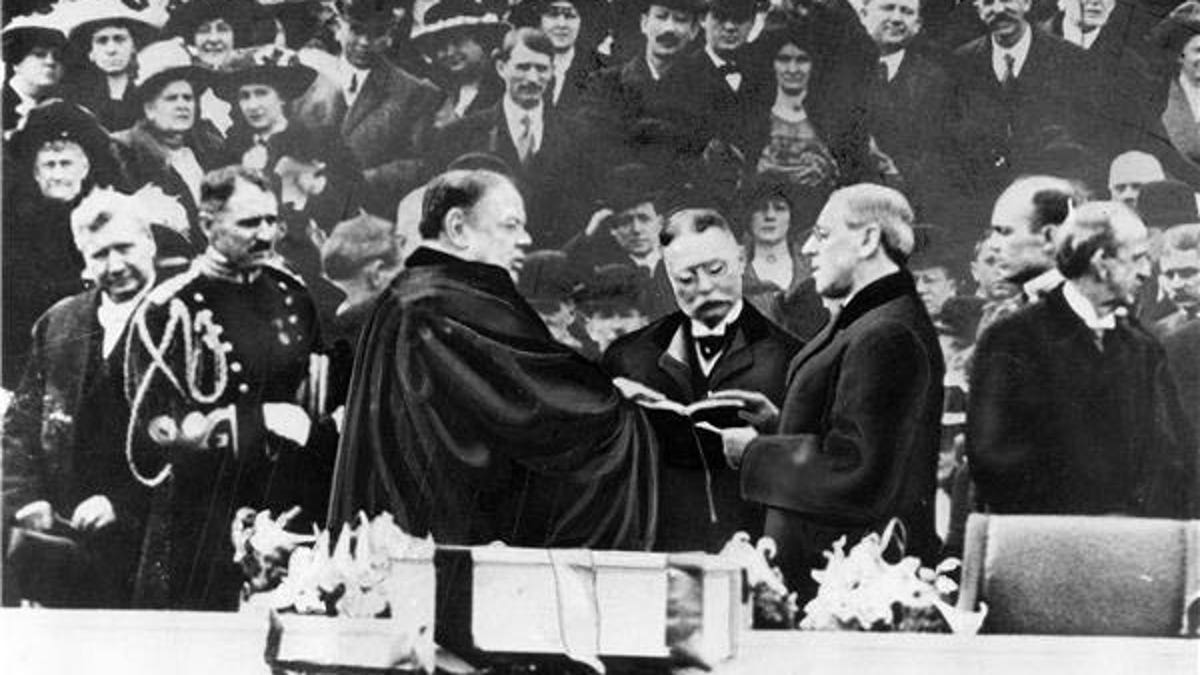 Woodrow Wilson takes the oath of office in 1913 for his first term of the Presidency on the East Portico at the U.S. Capitol in Washington, D.C.. Chief Justice is Edward D. White. (AP Photo)