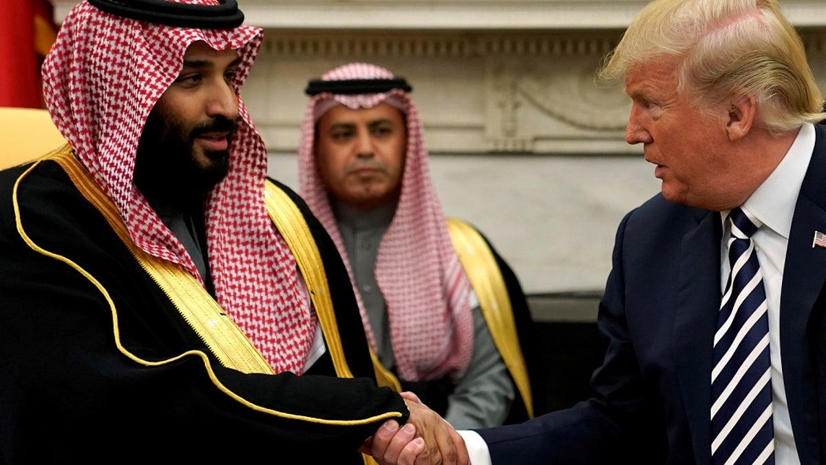 FILE PHOTO: U.S. President Donald Trump shakes hands with Saudi Arabia's Crown Prince Mohammed bin Salman in the Oval Office at the White House in Washington, U.S. March 20, 2018.  REUTERS/Jonathan Ernst/File Photo - RC15FBCC8C60