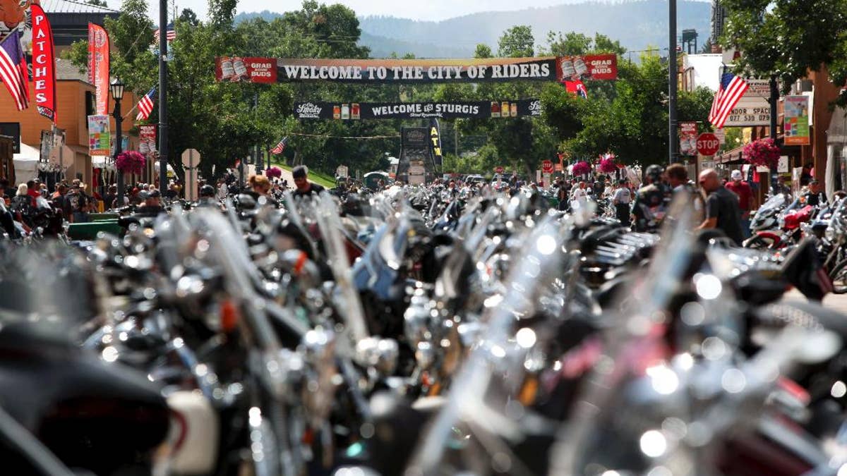 FILE - In this Aug. 1, 2014 file photo, the city streets of Sturgis are lined with motorcycles days before the official kickoff of the annual Sturgis Motorcycle Rally in Sturgis, S.D. Preparations are under way for the landmark 75th anniversary rally beginning Monday, Aug. 3, 2015, where organizers are planning for up to one million people. (AP Photo/Toby Brusseau, File)