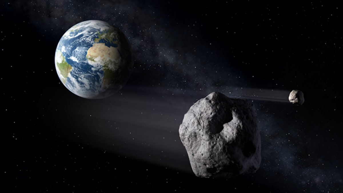 An artist's illustration of asteroids, or near-Earth objects, that highlight the need for a complete Space Situational Awareness system.