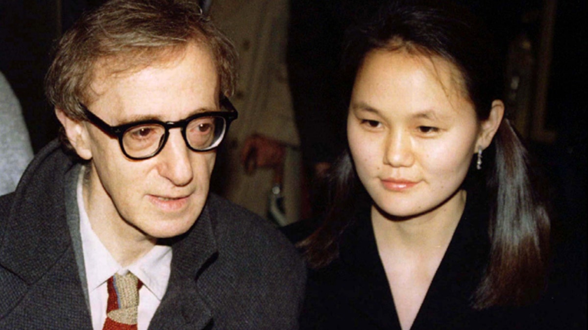 Woody Allen (L) and Soon-Yi Previn arrive for the premiere of Allen's movie, 