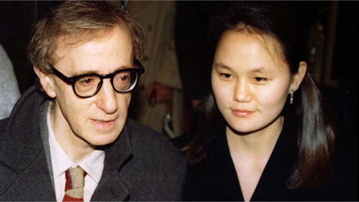 Woody Allen (L) and Soon-Yi Previn arrive for the premiere of Allen's movie, 