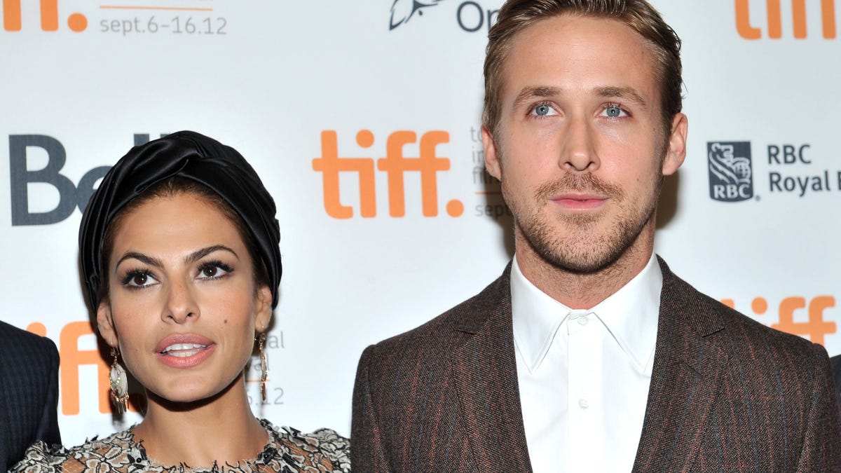 TORONTO, ON - SEPTEMBER 07:  Actors (L-R) Eva Mendes and Ryan Gosling attend 