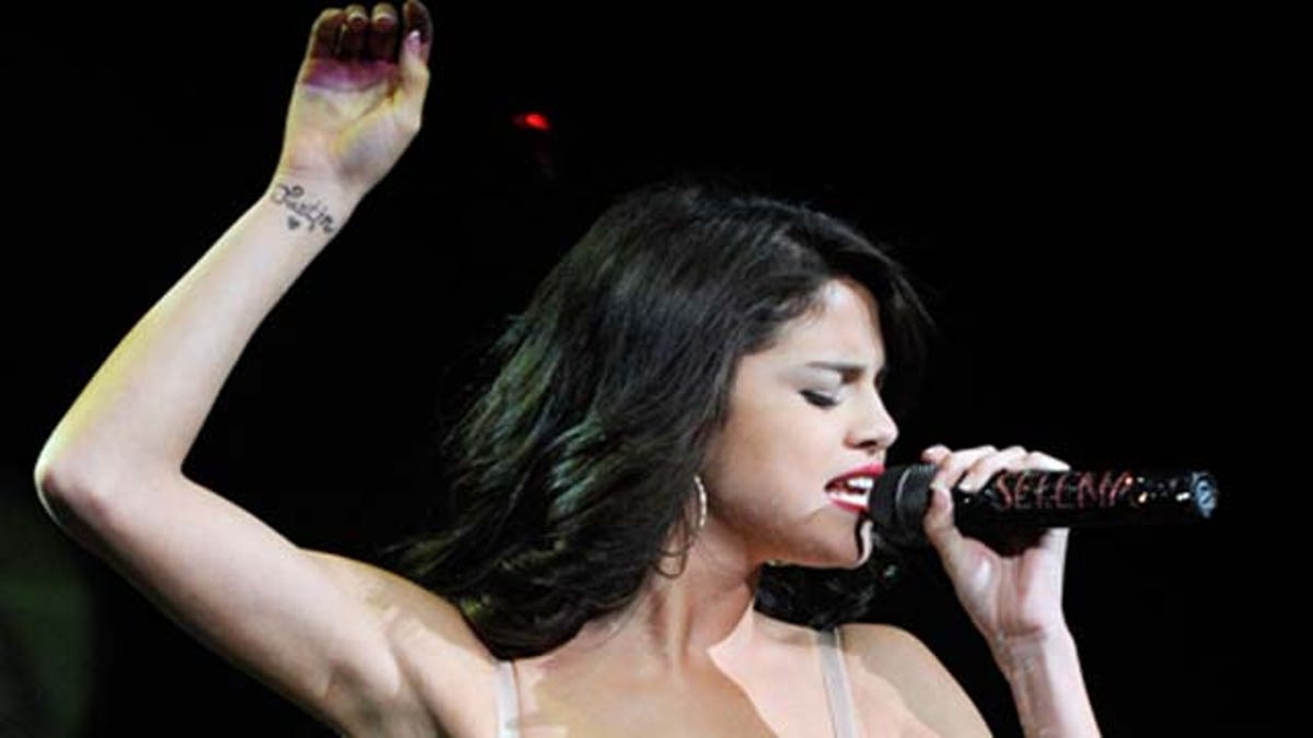 Selena Gomez Explains Her Tattoo + Ring From Justin Bieber