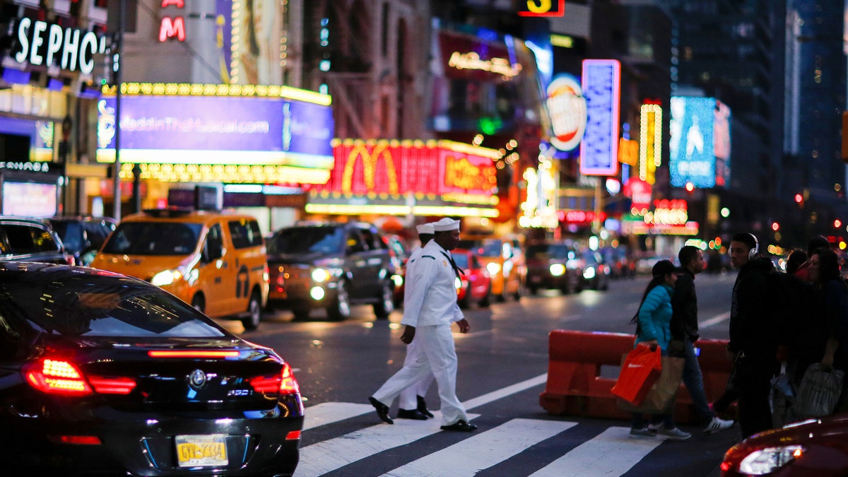 Service members of the United States Navy Walk in Times Square during the fleet week festivities in New York, U.S., May 29, 2017. REUTERS/Eduardo Munoz - RC1E55D8EC70