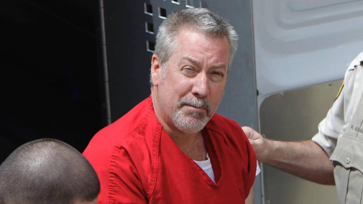 FILE - In this May 8, 2009 file photo, former Bolingbrook, Ill., police officer Drew Peterson arrives for court in Joliet, Ill. On Tuesday, July 7, 2015, Peterson is due back in court in Chester, Ill., as his trial on charges of plotting to kill a prosecutor approaches. Peterson has pleaded not guilty to charges of soliciting an unidentified prison inmate to kill Will County State's Attorney James Glasgow. (AP Photo/M. Spencer Green, File)