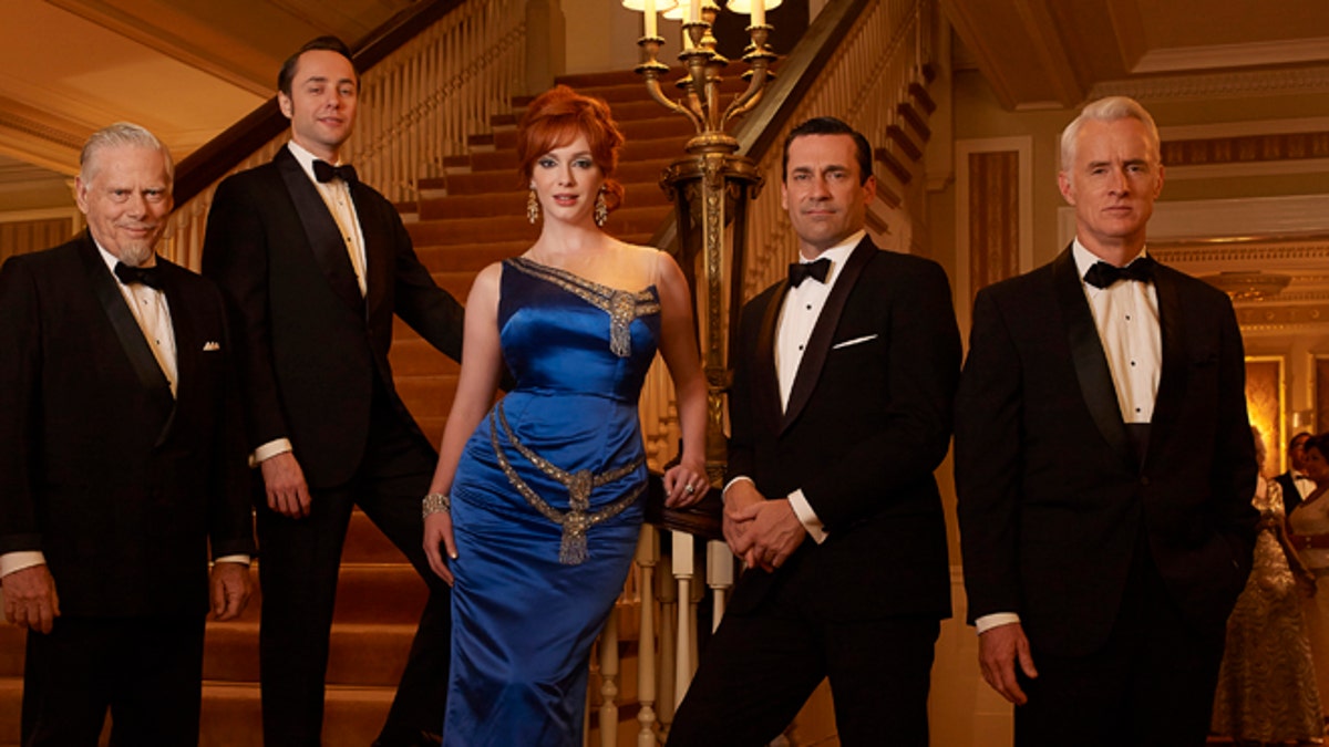 Bertram Cooper (Robert Morse), Pete Campbell (Vincent Kartheiser), Joan Harris (Christina Hendricks), Don Draper (Jon Hamm) and Roger Sterling (John Slattery) - Mad Men_Season 6, Gallery - Photo Credit: Frank Ockenfels/AMC