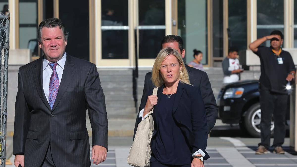 New Jersey Gov. Chris Christie's former Deputy Chief of Staff Bridget Anne Kelly, right, and her attorney Michael Critchley Jr., arrive at Federal Court for a hearing Tuesday, Sept. 13, 2016, in Newark, N.J. Kelly and Bill Baroni, New Jersey Gov. Chris Christie's former top appointee at the Port Authority of New York and New Jersey, are facing charges of politically motivated lane closures of the George Washington Bridge in 2013. (AP Photo/Mel Evans)