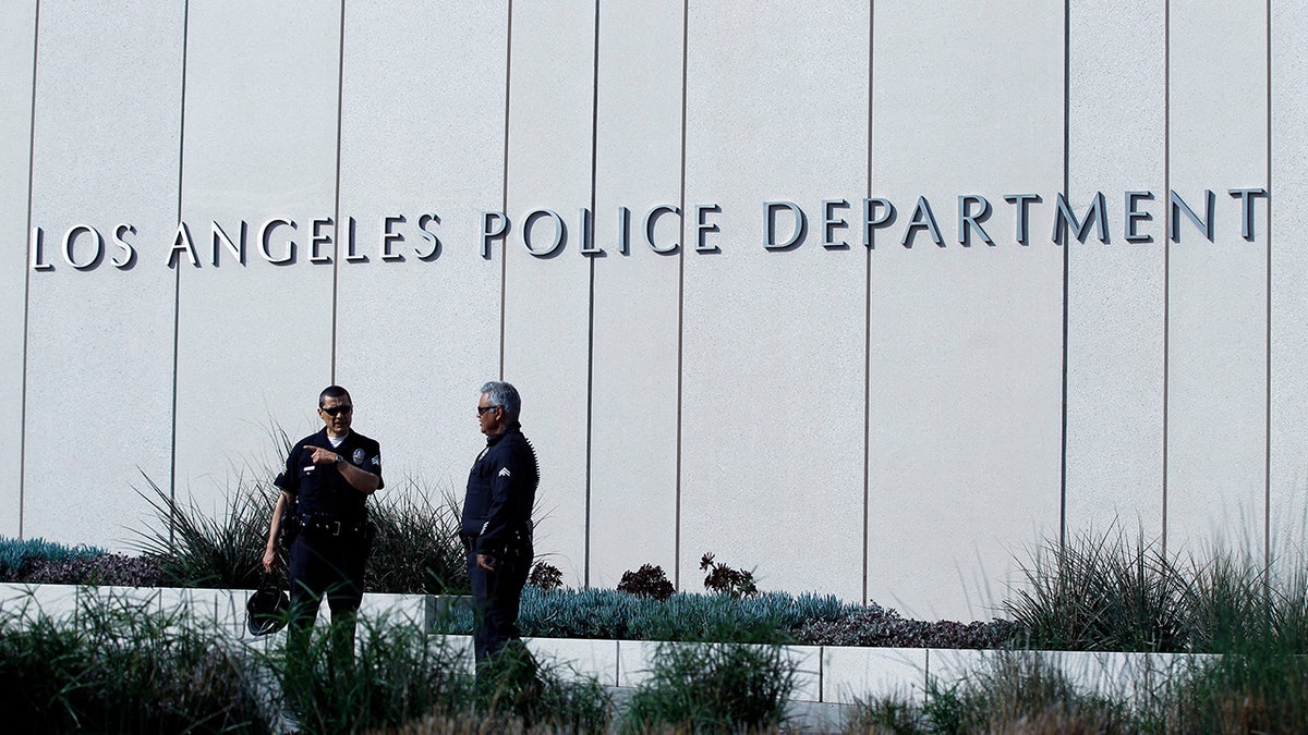 Los Angeles Police Department headquarters with officers outside the building
