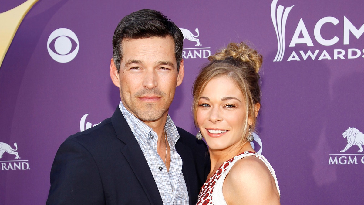 This April 1, 2012 file photo shows country singer LeAnn Rimes, right, and her husband Eddie Cibrian at the 47th Annual Academy of Country Music Awards in Las Vegas. 