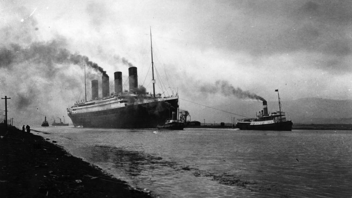The SS 'Titanic', leaving Belfast to start her trials, pulled by tugs, shortly before her disastrous maiden voyage of April 1912. (Photo by Topical Press Agency/Getty Images)