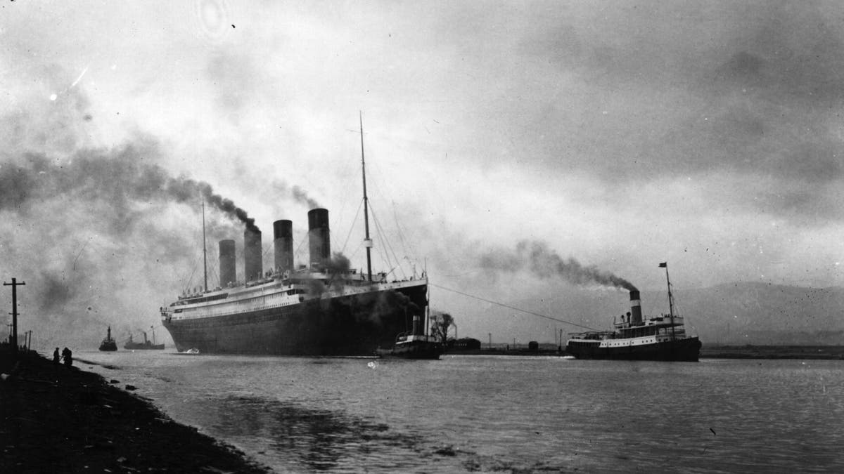 The SS 'Titanic', leaving Belfast to start her trials, pulled by tugs, shortly before her disastrous maiden voyage of April 1912. (Photo by Topical Press Agency/Getty Images)