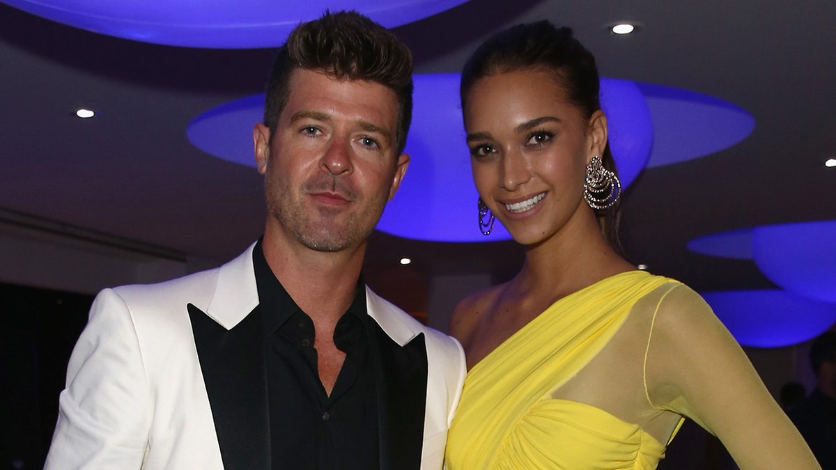 Robin Thicke and April Love Geary