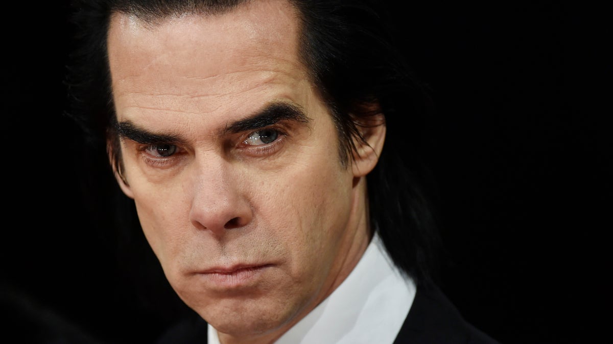 Australian musician Nick Cave arrives at the British Academy of Film and Arts (BAFTA) awards ceremony at the Royal Opera House in London February 8, 2015. REUTERS/Toby Melville (BRITAIN - Tags: ENTERTAINMENT) - RTR4OPSV