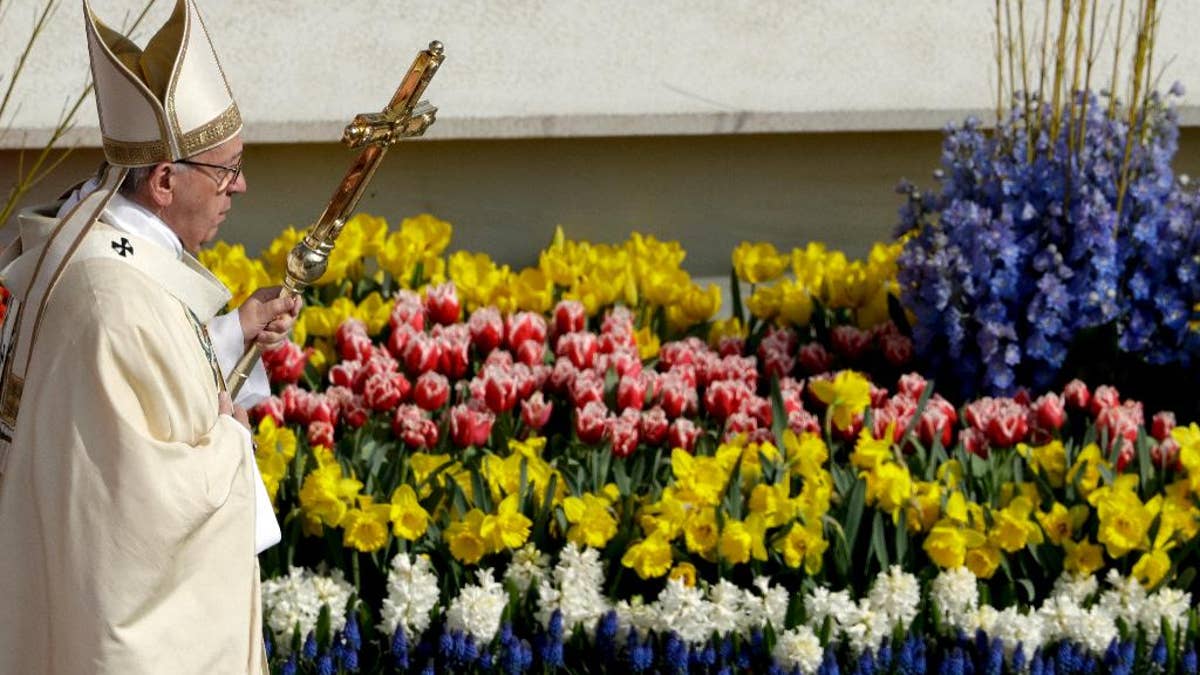 Pope Francis celebrates the Easter Mass, in St. Peter's Square, at the Vatican, Sunday, April 16, 2017. (AP Photo/Andrew Medichini)