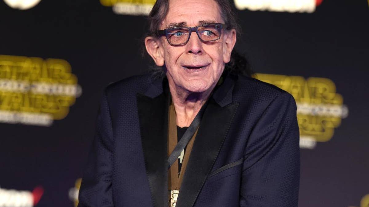 FILE - In this Dec. 14, 2015, file photo, Peter Mayhew arrives at the world premiere of