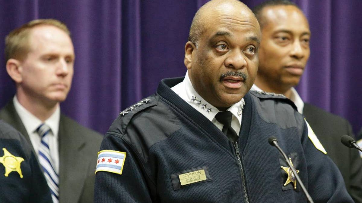 Chicago Police Department Superintendent Eddie Johnson speaks during a news conference Wednesday, April 5, 2017, in Chicago. Police announced that Maurice Harris has been charged with four counts of first-degree murder in the fatal shootings of four men at or near a Chicago restaurant, on March 30, 2017. Harris who is charged in the likely gang-related killings of the four men on Chicago's South Side had lost his father in another shooting a day earlier in the same neighborhood. (AP Photo/Teresa Crawford)