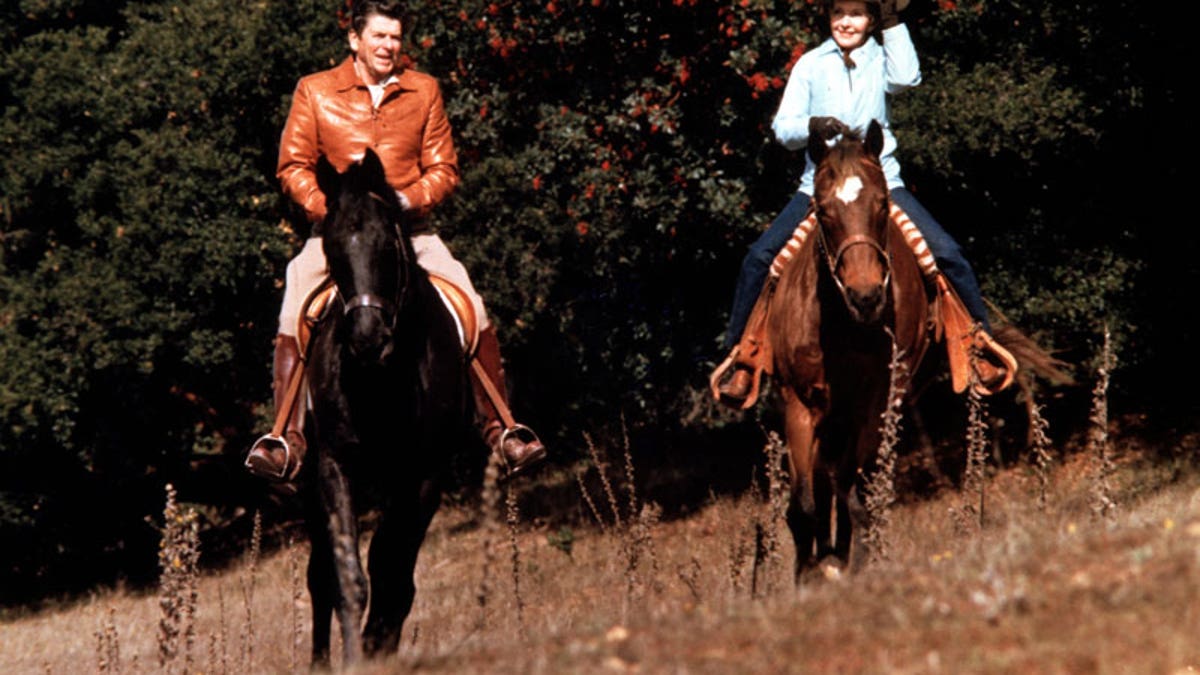 President and Nancy Reagan ride horses