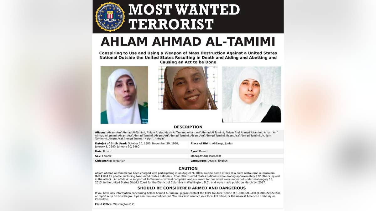 This image provided by the FBI is the most wanted poster for Ahlam Aref Ahmad Al-Tamimi, a Jordanian woman charged in connection with a 2001 bombing of a Jerusalem pizza restaurant that killed 15 people and injured dozens of others. The case against Ahlam Aref Ahmad Al-Tamimi was filed under seal in 2013 but announced publicly by the Justice Department on March 14, 2017. The FBI has added Al-Tamimi, who served eight years in prison after pleading guilty in an Israeli court, to its list of Most Wanted Terrorists. (FBI via AP)